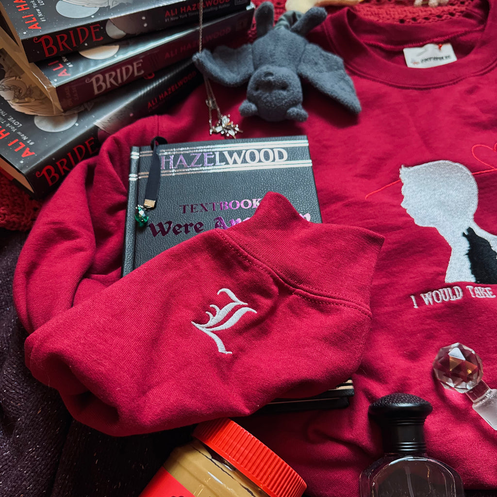 Red sweatshirt with a white embroidered L.